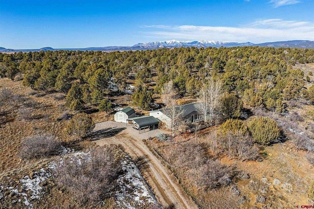 4.7 Acres of Residential Land with Home for Sale in Durango, Colorado