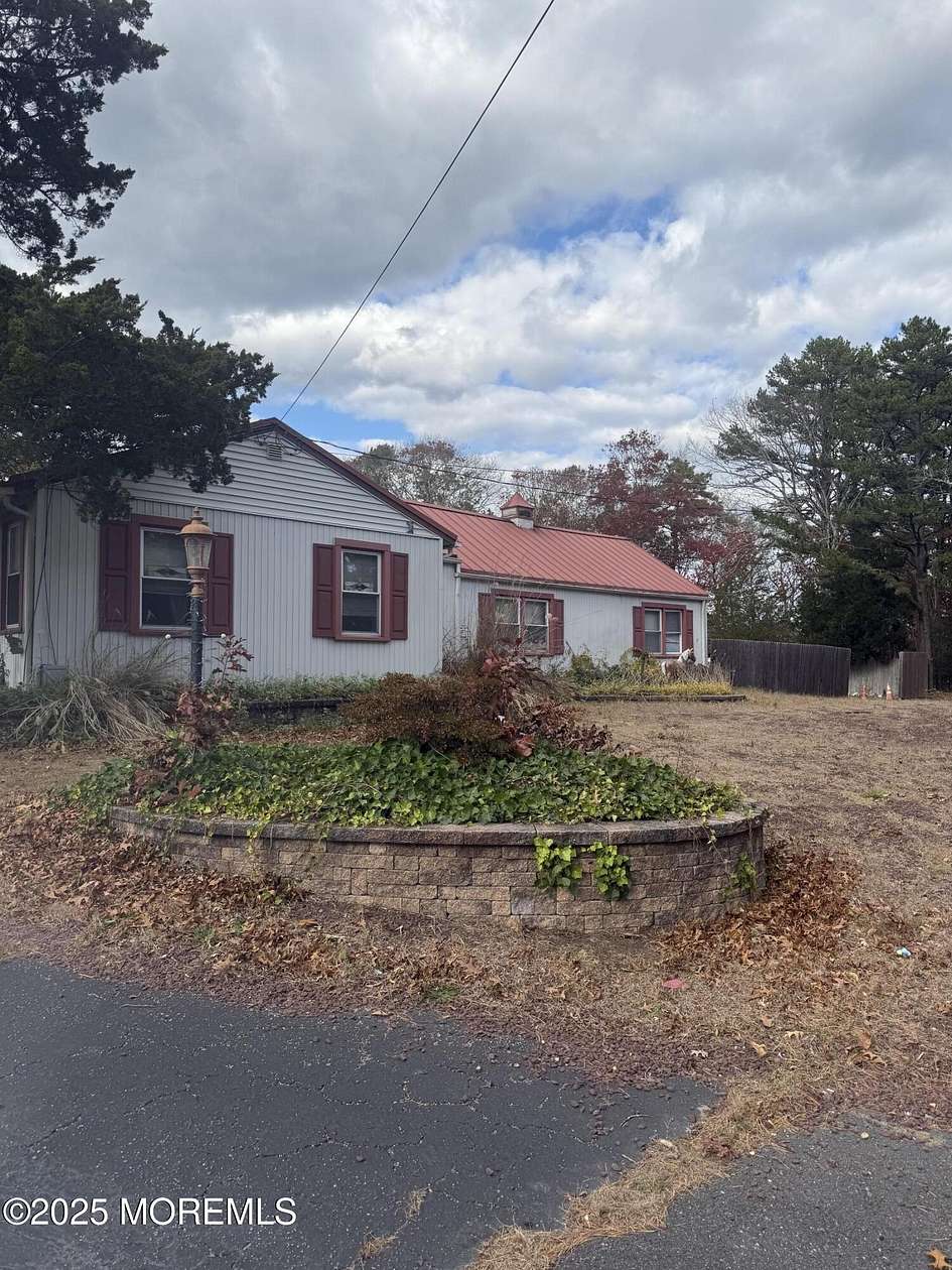 3 Acres of Residential Land with Home for Sale in West Creek, New Jersey