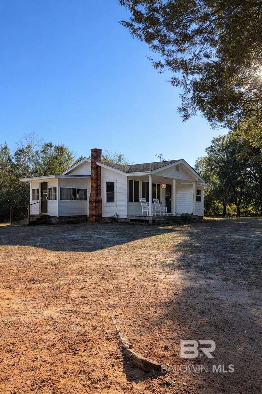 12.2 Acres of Recreational Land with Home for Sale in Evergreen, Alabama