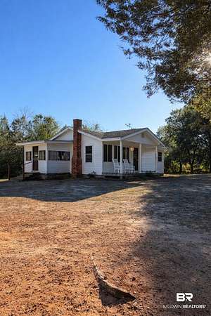 12.2 Acres of Recreational Land with Home for Sale in Evergreen, Alabama