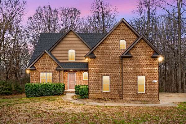 2 Acres of Residential Land with Home for Sale in Palmyra, Tennessee