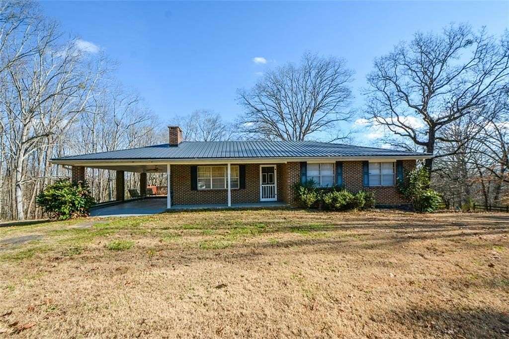 70.4 Acres of Agricultural Land with Home for Sale in Ellijay, Georgia