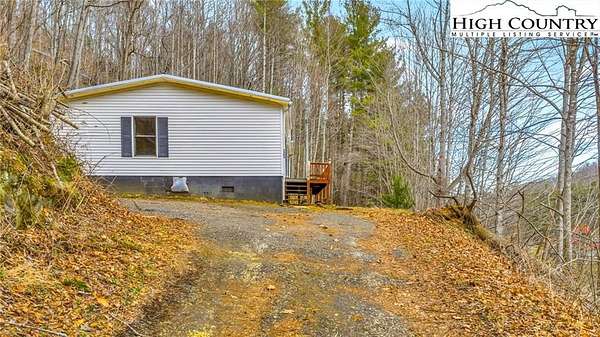 8 Acres of Land with Home for Sale in Jefferson, North Carolina