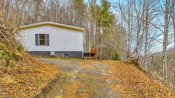 8 Acres of Land with Home for Sale in Jefferson, North Carolina