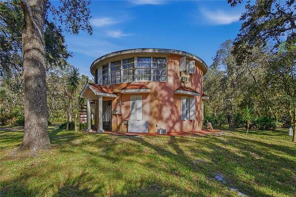 5.69 Acres of Residential Land with Home for Sale in New Port Richey, Florida