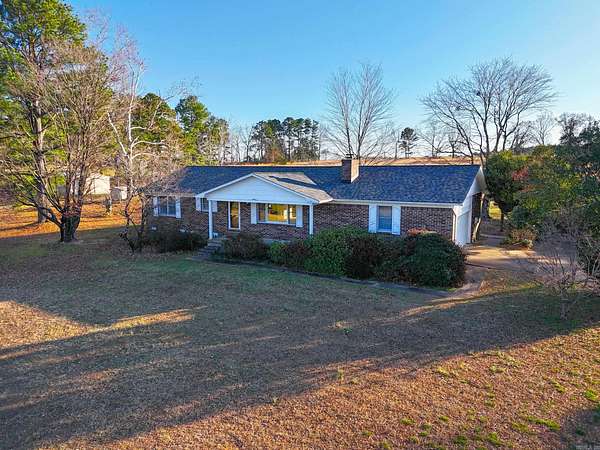 42 Acres of Land with Home for Sale in Clarksville, Arkansas
