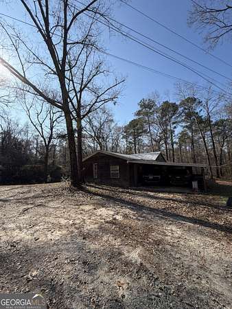7.83 Acres of Residential Land with Home for Sale in Dry Branch, Georgia