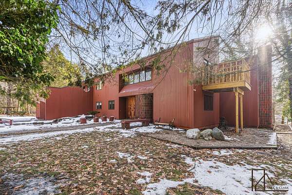 4 Acres of Residential Land with Home for Sale in Norton Shores, Michigan