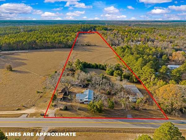9 Acres of Residential Land with Home for Sale in Box Springs, Georgia