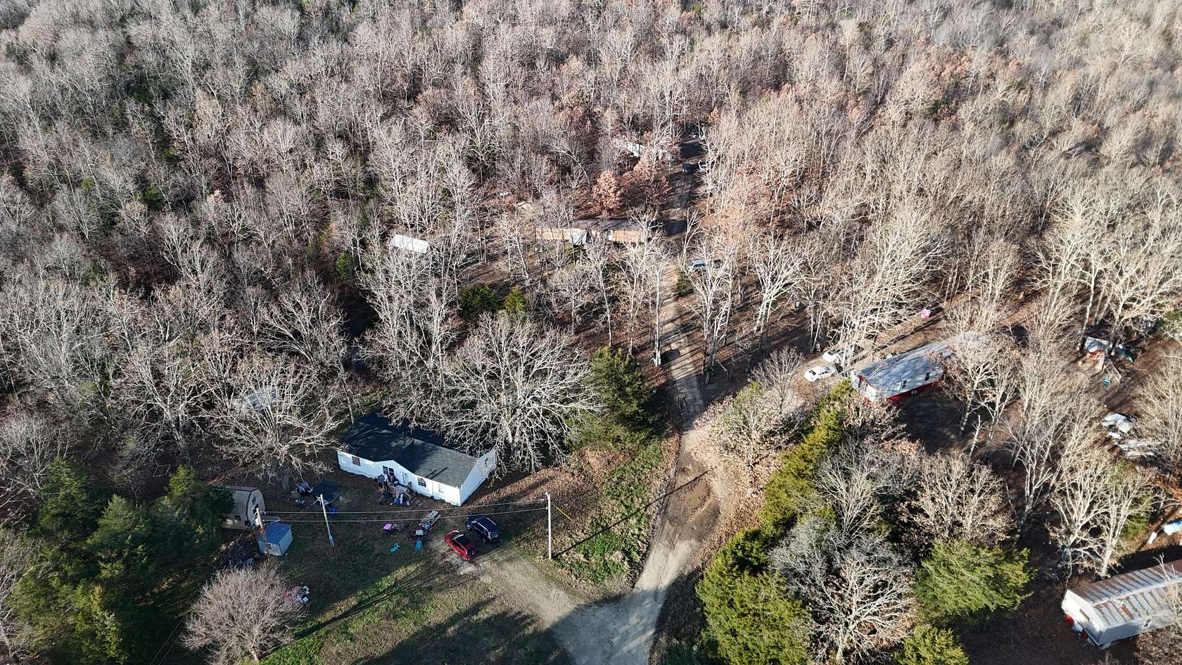 22 Acres of Land with Home for Sale in Grovespring, Missouri