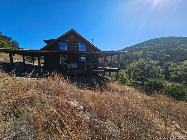 10.2 Acres of Recreational Land with Home for Sale in Leakey, Texas