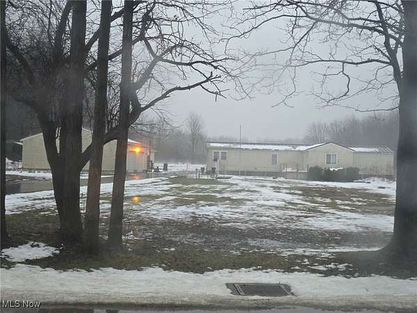 10.2 Acres of Land with Home for Sale in Jefferson, Ohio