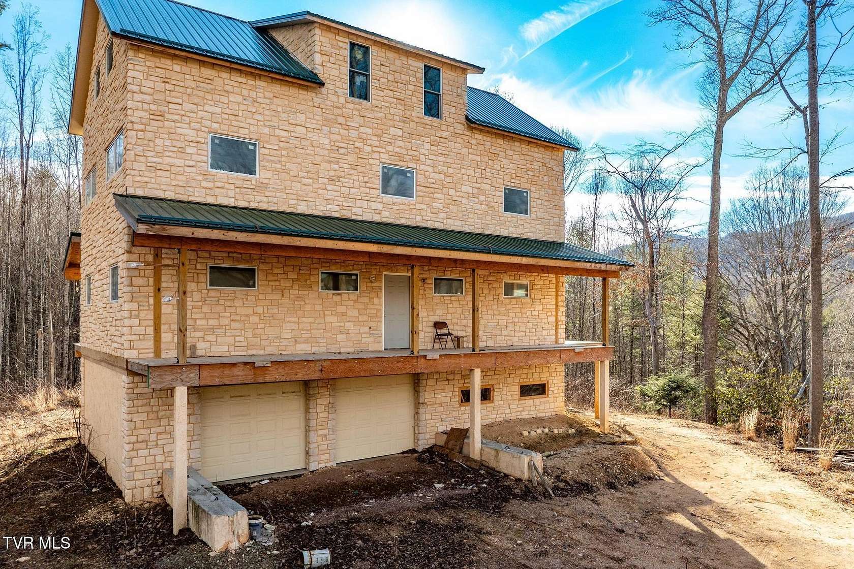 12.3 Acres of Land with Home for Sale in Trade, Tennessee