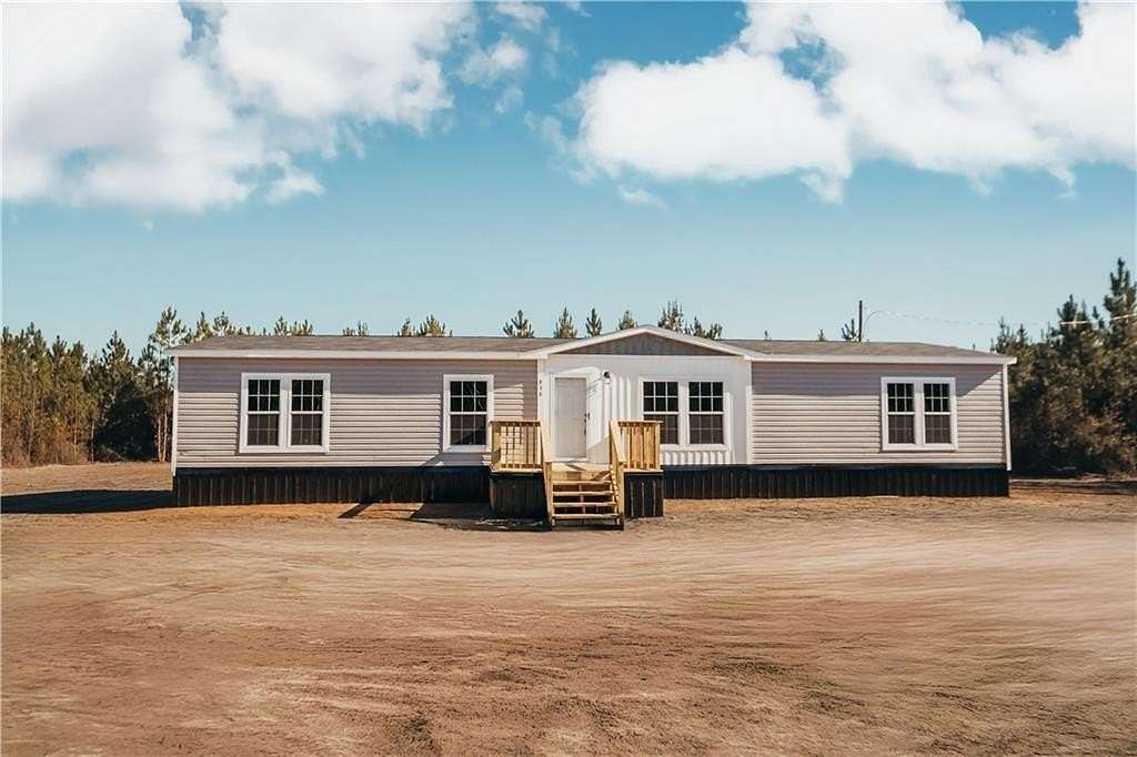 13.4 Acres of Land with Home for Sale in Hortense, Georgia