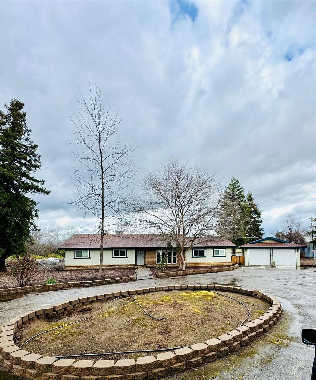 6.56 Acres of Land with Home for Sale in Reedley, California