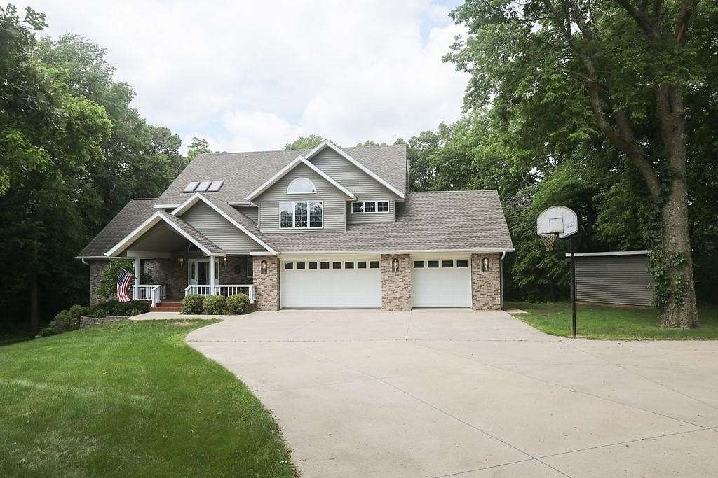 22.8 Acres of Recreational Land with Home for Sale in Estherville, Iowa
