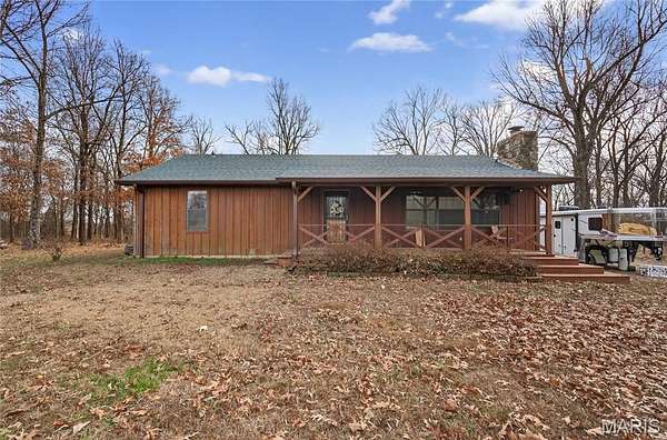 16.2 Acres of Land with Home for Sale in Poplar Bluff, Missouri