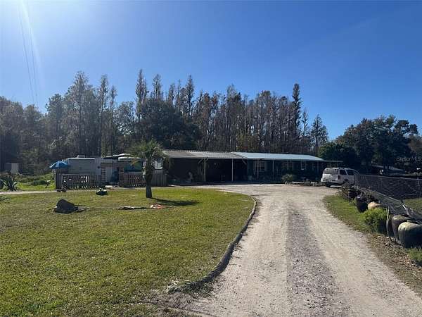 1.53 Acres of Residential Land with Home for Sale in Zephyrhills, Florida