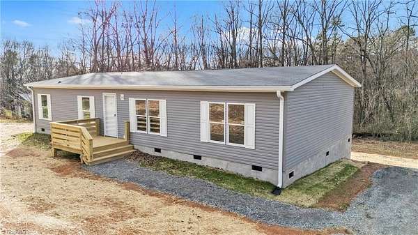 1.5 Acres of Residential Land with Home for Sale in Elkin, North Carolina