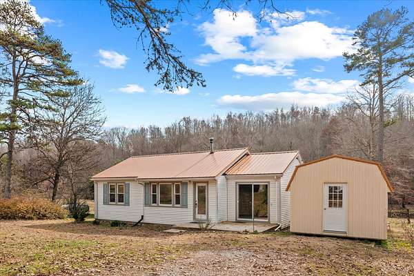 10 Acres of Land with Home for Sale in Centerville, Tennessee