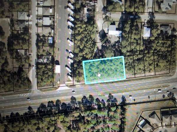 0.57 Acres of Commercial Land for Sale in Gulf Breeze, Florida