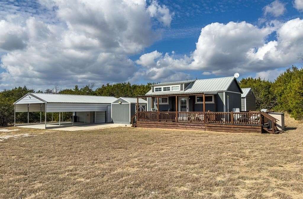 13.3 Acres of Recreational Land with Home for Sale in Blum, Texas