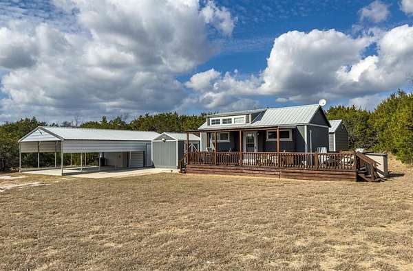 13.3 Acres of Recreational Land with Home for Sale in Blum, Texas