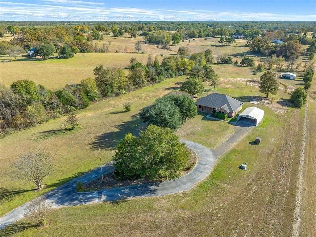 6 Acres of Residential Land with Home for Sale in Grand Saline, Texas