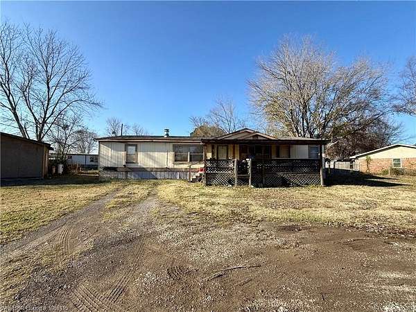 4.6 Acres of Residential Land with Home for Sale in Pocola, Oklahoma