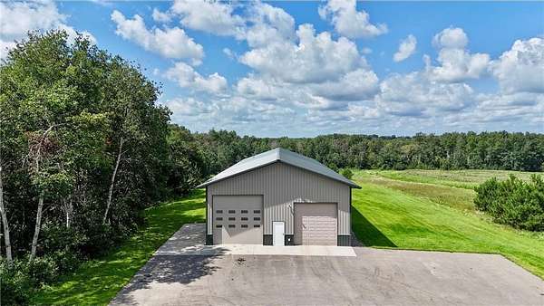 2.65 Acres of Residential Land with Home for Sale in Pike Creek Township, Minnesota