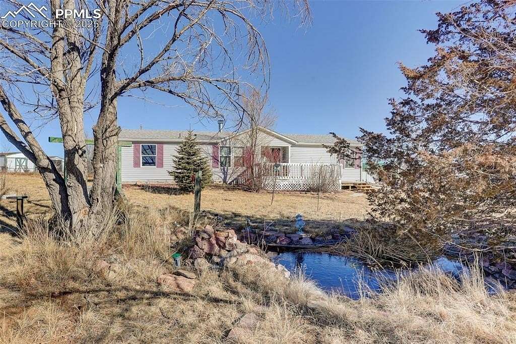 5 Acres of Residential Land with Home for Sale in Peyton, Colorado
