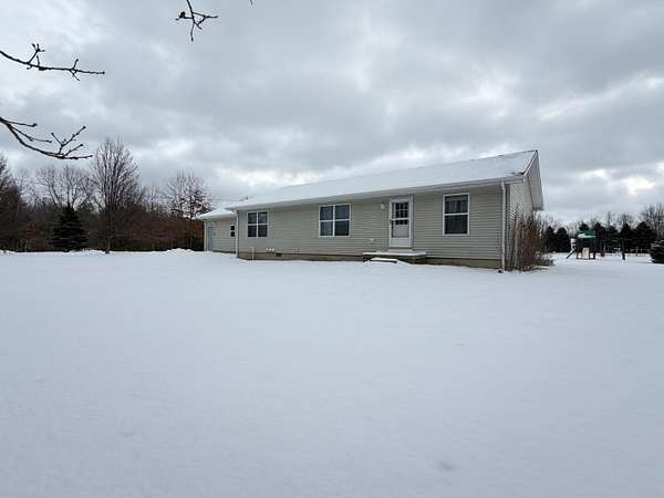 2.6 Acres of Residential Land with Home for Sale in Kent City, Michigan
