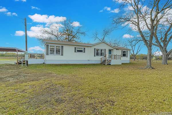5.26 Acres of Residential Land with Home for Sale in Lytle, Texas