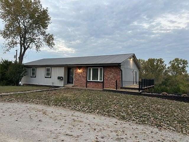 4.9 Acres of Residential Land with Home for Sale in Paola, Kansas