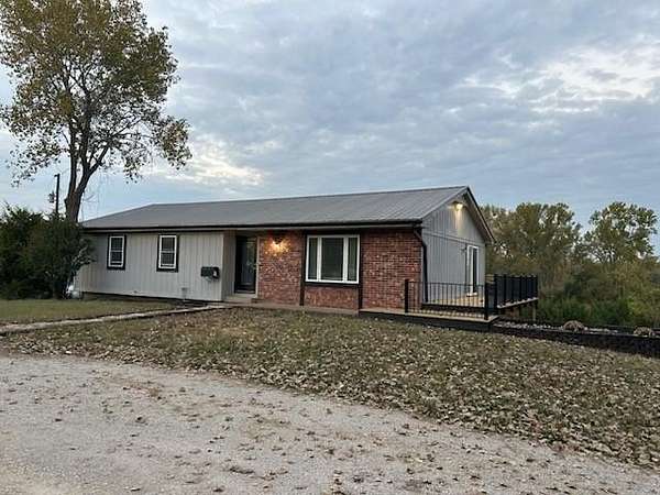 4.9 Acres of Residential Land with Home for Sale in Paola, Kansas