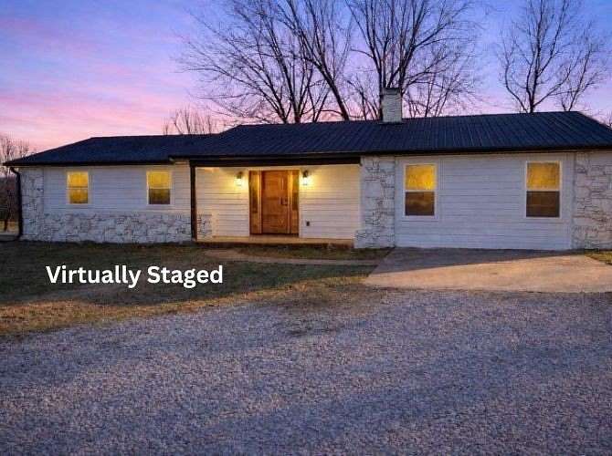 7.5 Acres of Land with Home for Sale in Huntsville, Arkansas