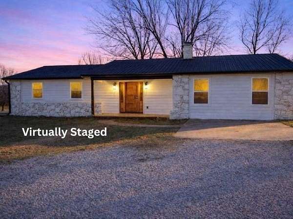 7.5 Acres of Land with Home for Sale in Huntsville, Arkansas