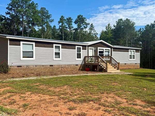 8.37 Acres of Land with Home for Sale in Roopville, Georgia