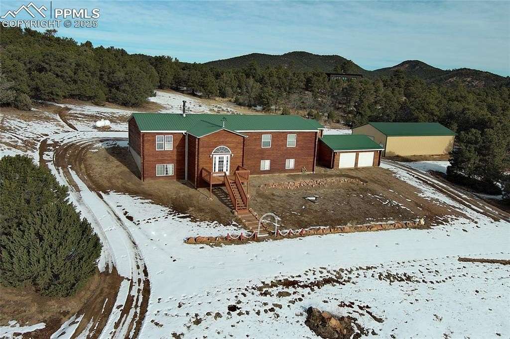 5.3 Acres of Residential Land with Home for Sale in Cotopaxi, Colorado