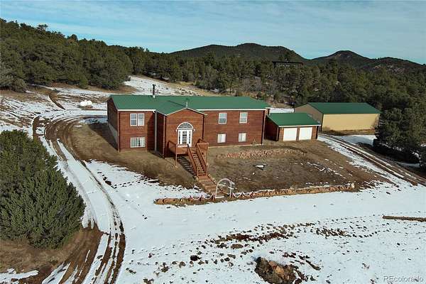 5.3 Acres of Land with Home for Sale in Cotopaxi, Colorado
