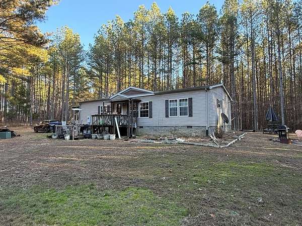 15.1 Acres of Recreational Land with Home for Sale in Camden, Tennessee