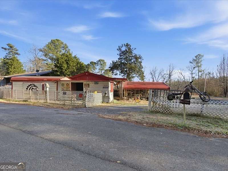 2 Acres of Land with Home for Sale in Sugar Valley, Georgia