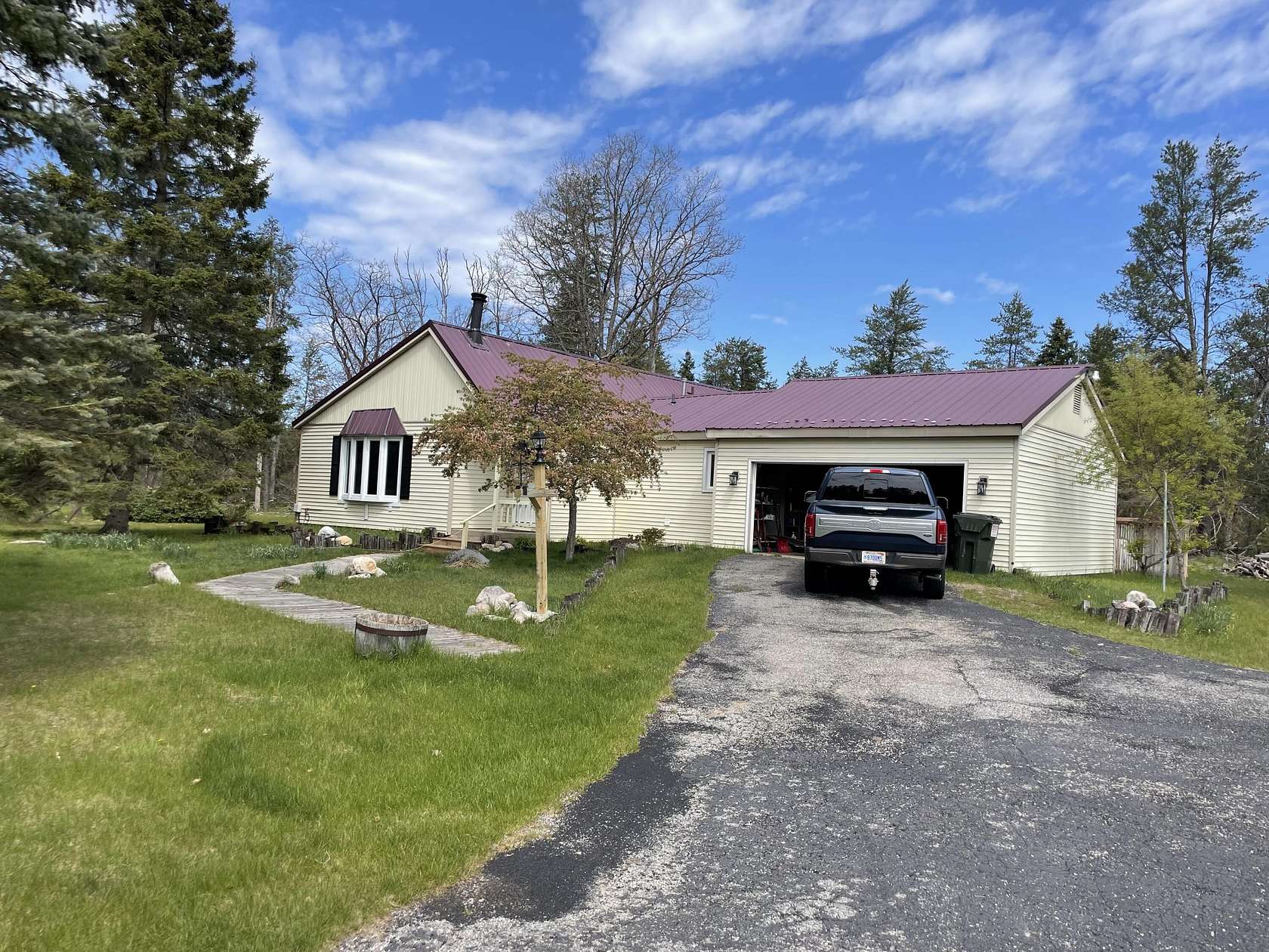10 Acres of Recreational Land with Home for Sale in Irons, Michigan