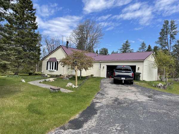 10 Acres of Recreational Land with Home for Sale in Irons, Michigan