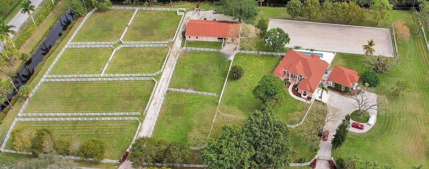 6.44 Acres of Land with Home for Sale in The Acreage, Florida