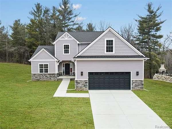 2 Acres of Land with Home for Sale in Hartland Township, Michigan