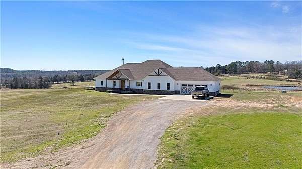30.8 Acres of Agricultural Land with Home for Sale in Ozark, Arkansas