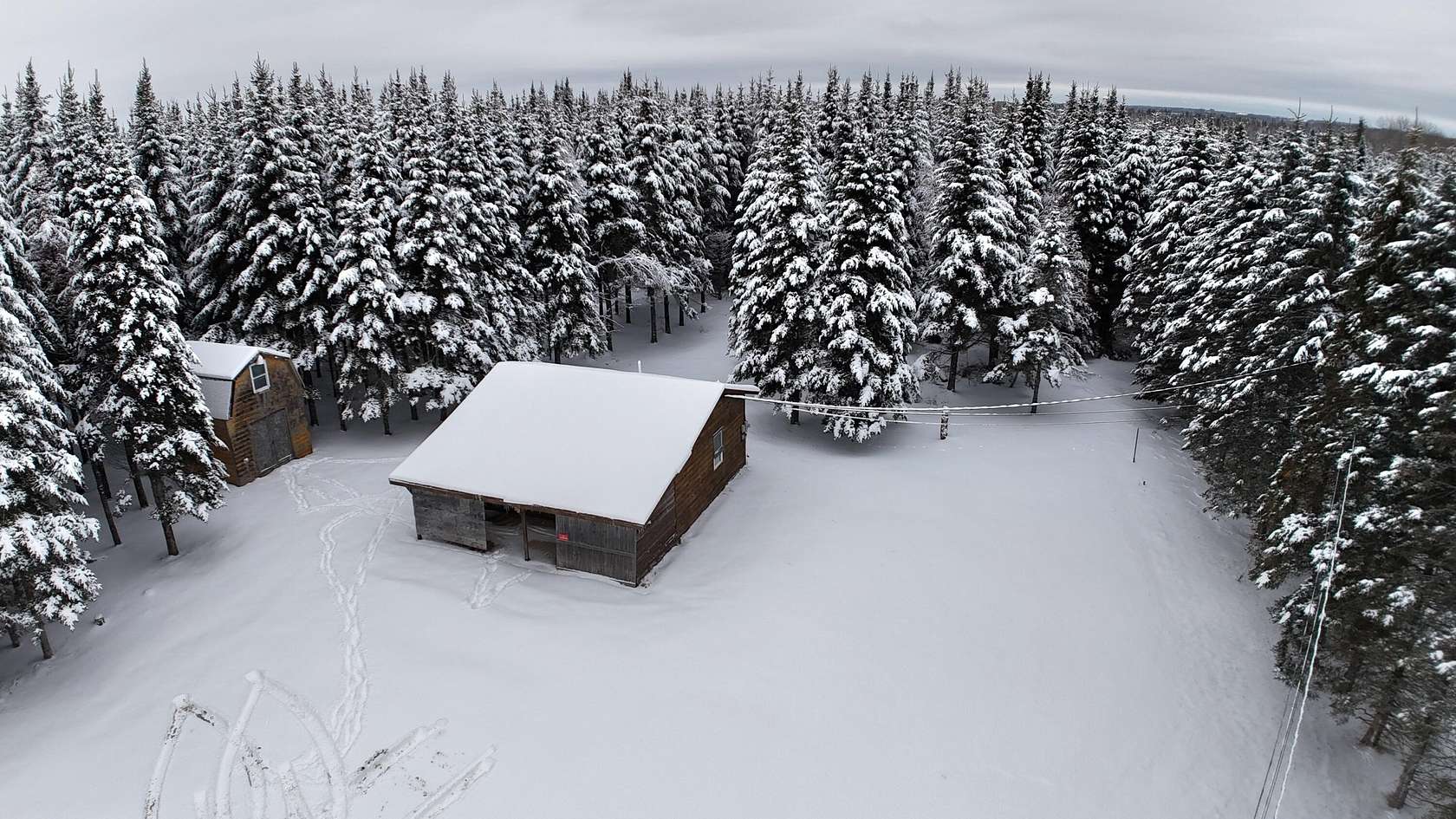 1.53 Acres of Residential Land with Home for Sale in Limestone, Maine