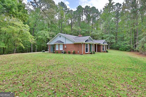 5 Acres of Residential Land with Home for Sale in Fortson, Georgia