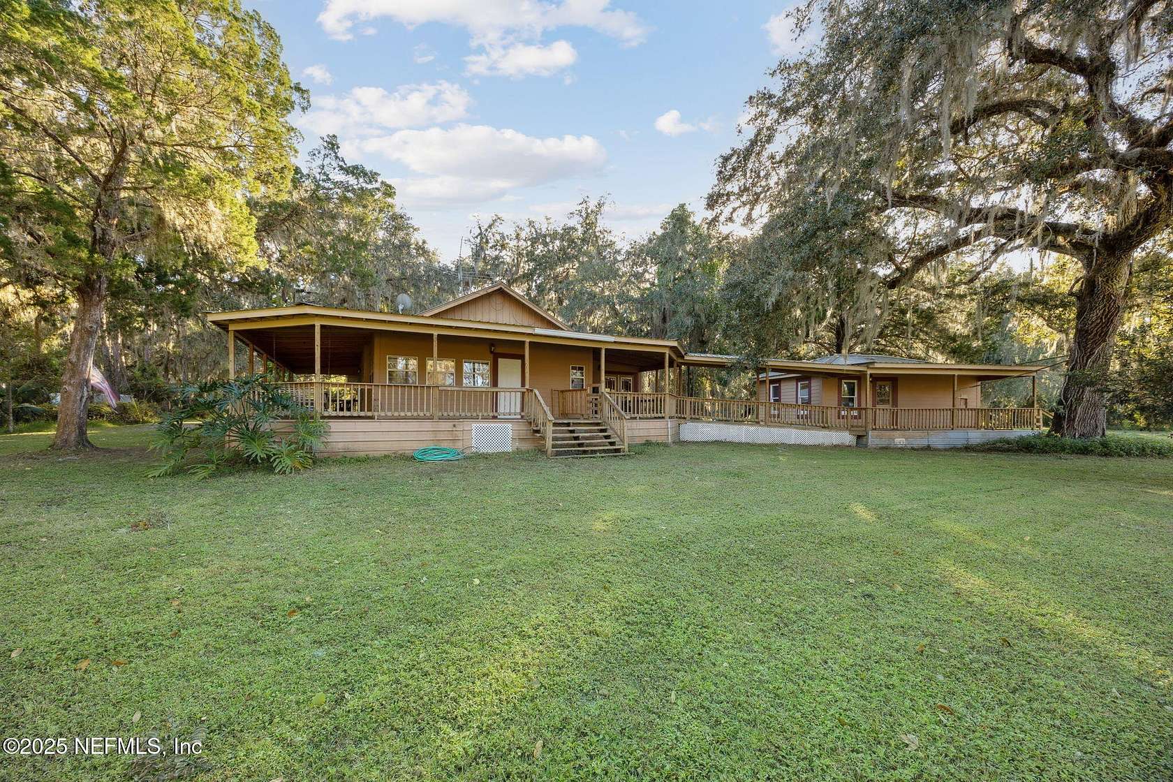 4.1 Acres of Residential Land with Home for Sale in Crescent City, Florida